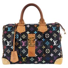 100% authentic Louis Vuitton limited edition Speedy 30 in collaboration with artist Takashi Murakami for SS 2003 in black Monogram Multicolore canvas. Features a flap pocket with push-lock on the front, brass corners and leather clochette and handles . Lined in camel canvas with an open pocket against the back. Has been carried with overall patina to leather and metal and heavy darkening to the handles. Comes with clochette and key. Overall in very good condition. 2003 Spring/Summer Measurements Brass Corners, Louis Vuitton Limited Edition, Takashi Murakami, Speedy 30, Authentic Louis Vuitton, Fashion Handbags, Flap Pocket, Alligator, Metallica