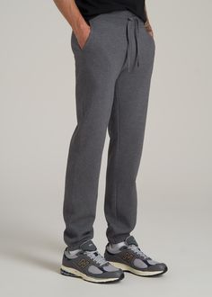 The Ultimate Fleece Sweatpants for Tall Men Relax, You’re Covered Introducing the Wearever 2.0 Fleece Sweatpants—because tall guys deserve the best chill pants too! These aren’t just any tall men's sweatpants; they’re your new go-to for everything from Netflix marathons to casual Fridays. With a new and improved waistband and stylish woven drawcords, you get the comfort you crave with the style you need. Plus, the soft fleece of these men's extra-long sweatpants keeps you warm while the stretch