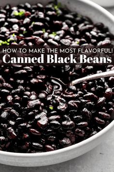 a white bowl filled with black beans and the words how to make the most flavored canned black beans