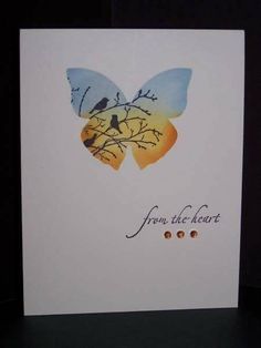 a white card with a blue butterfly on it and the words from the heart written below