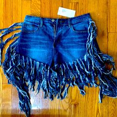 Fringe Jean Shorts Size Medium, Very Stretchy. Will Fit A Size Small For A Baggy Look Or Large For A More Fitted Look. Medium Wash Cotton Bottoms For Festival, Denim Blue Cotton Bottoms For Festival, Festival Denim Blue Cotton Bottoms, Stretch Jean Shorts With Frayed Hem In Dark Wash, High Waist Bottoms With Frayed Hem For Festival, Stretch Dark Wash Jean Shorts With Frayed Hem, Stretch Denim Blue Cutoff Shorts, Fitted Denim Shorts For Festivals, Casual Medium Wash Bottoms For Festival