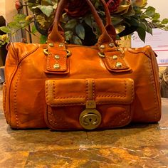 Francesco Biasia 1977 Vintage Handle Bag. Leather Antiqued Gold Tone Hardware Rolled Handles Vintage Condition With Leather Wear. Brown Leather Satchel, Black Leather Satchel, Metallic Purse, Bags Vintage, Leather Wear, Leather Satchel Bag, Black Leather Handbags, Satchel Handbags, Leather Buckle