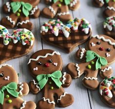 many decorated cookies are on a table