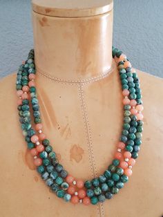 "Featuring this Triple Strand beaded necklace made using Sterling Silver Finding and hook clasp and round gemstones. The gemstones are Green with a White Matrix Jasper and Pinkish Orange Rose Quartz and are strung onto wire. The necklace has a cascading bib with 3 layers. The gemstones are cold to the touch are considered Semi-Precious Stones. The color combination is so appealing to the eye and would match just about any outfit. The necklace is heavy and constructed very sturdy. I believe that Jean Art, Nice Necklaces, 3 Layer Necklace, Semi Precious Necklace, Pinkish Orange, Lucite Jewelry, Green Jasper, Stone Beaded Necklace, Beading Ideas