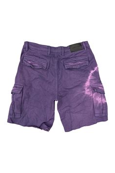 Style No. P516-TCGB223 Color: Purple This lightweight short is designed with circular bleach detailing on the right leg. This style is constructed from a soft twill and features light fraying at the hem, two large cargo pockets at the sides, a button closure and reinforced belt loops. 100% Cotton. Lined back pockets and yoke. Reinforced belt loops. Cargo Pockets. Purple Brand P516 Twill Grape Cargo Short. Urban Style Short Bottoms With Cargo Pockets, Urban Style Bottoms With Cargo Pockets And Short Length, Urban Style Short Length Bottoms With Cargo Pockets, Urban Short-length Bottoms With Cargo Pockets, Urban Style Cargo Shorts With Pockets For Summer, Urban Bottoms With Patch Pockets For Summer, Casual Acid Wash Cargo Pants, Short Cotton Cargo Pants For Streetwear, Cotton Bermuda Bottoms With Cargo Pockets