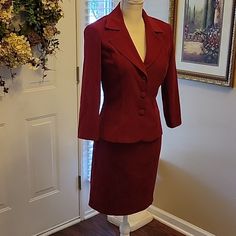 B Smart Dark Red/Wine Stretch Suede-Like Fabric 2 Piece Skirt Set. Jacket And Pencil Skirt. Jacket Has Notched Collar. 3 Covered Button Closure. 3/4 Sleeve Fitted. Lightly Padded Shoulders. Skirt Has Back Zipper. 14" Across Waist 18" Across Hips 19" Long. Size 3/4. 97% Polyester 3% Spandex. Washable. New With Tags. Fitted Skirt Suit With Pockets For Fall, Red Long-sleeve Skirt Suit For Office, Tailored Red Skirt Suit For Office, Red Long Sleeve Skirt Suit For Work, Fall Formal Red Skirt Suit, Tailored Red Long Sleeve Skirt Suit, Classic Red Skirt Suit For Work, Fitted Red Blazer With Pockets, Red Fitted Blazer With Pockets