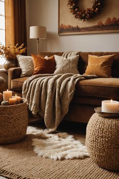 a living room filled with furniture and candles