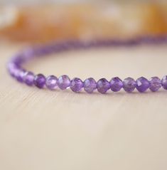 Wrap yourself in sparkle with this faceted Amethyst bracelet! Amethyst, the purple variety of Quartz, is said to encourage selflessness and spiritual wisdom, while improving motivation. It is a meditative gem that aids in providing a sense of calm, balance, and peace--who wouldn't want to tap into that goodness? Our bracelet is handmade in sterling silver or 14k gold filled with natural, micro-faceted Amethyst for extra sparkle! GEMSTONE: Natural Purple Amethyst STONE SIZE: 3mm (.1") SIZING: Ple Purple Amethyst Faceted Beaded Bracelets, Purple Faceted Amethyst Beaded Bracelets, Faceted Purple Amethyst Beaded Bracelets, Spiritual Purple Faceted Beaded Bracelets, Spiritual Faceted Purple Beaded Bracelets, Faceted Purple Beaded Bracelets, Purple Faceted Spiritual Bracelets, Spiritual Purple Faceted Bracelets, Spiritual Faceted Purple Bracelets