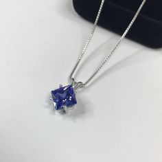 "Beautiful Trillion Tanzanite* & Sterling Silver Pendant Necklace * 2ct Princess Cut Tanzanite* measures 8mm * Solid Sterling Silver * 16\" or 18\" Sterling Silver Chain included-select your length Hallmarked & Gift Ready! Matching Ring available here https://www.etsy.com/listing/511156028/gorgeous-25ct-princess-cut-tanzanite Matching Earrings Also Available! *Tanzanite is one of very few gemstones that cannot be grown in a Lab, however, these Laboratory Grown Simulate Stones are optical Luxury Tanzanite Jewelry With Tension Setting, Luxury Radiant Cut Tanzanite Jewelry, Tanzanite Pendant, Tanzanite Necklace, Tanzanite Jewelry, Matching Ring, Fine Art Jewelry, Pretty Jewelry, Mens Pendant