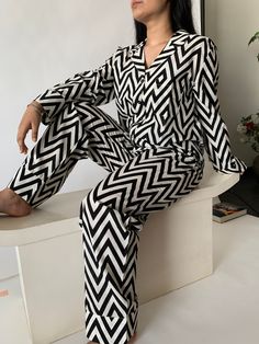 Lounge in style at home in this comfy cool Night suit set! You will definitely fall in love with this beautiful elegant wear with zig zag print. This piece is a set of two - shirt and pyjamas The shirt is front open with buttons and the pyjamas have a soft elastic with a string to tie. The fabric is pre-washed before tailoring and hence is free from any chemicals and is extra soft and ready to wear. Material: Pure cotton Wash Care: Gentle hand wash. Wash in cold water using a mild detergent. Do Elegant Wear, Bone Structure, Cool Night, Pyjamas Set, Zig Zag Print, Sleep Wear, Night Suit, Womens Pyjama Sets, Night Wear