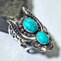 Unisex Ring, Sterling Silver And Turquoise Gothic, Ethnic. Size 7.5. Top Of Ring Display Is 1.5". All Jewelry Is New And Comes In Jewelry Pouch Or Gift Box. Bundle 3 Or More Items Receive Free Shipping. Other Listings, Chic, Boho, Classy, Glass, Beads, Sterling Silver, Stainless Steel, Tropical, Oceanic, Coastal, Traditional, Rainbow, Colors, Blue, Green, Red, Black, Silver, Orange, Pink, Purple, Yellow, Clear, Modern, Gothic, Natural, Stone, Crystal, Gemstone, Durable, Unique, Gift, Nature, Nat Jewel Nails, Coastal Traditional, Inspo Art, Modern Gothic, Ring Display, Nail Jewels, Front Tuck, Ring Displays, Green Opal