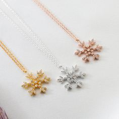 This snowflake necklace symbolizes beauty, spotless, pure and noble. The delicate design makes you always beautiful and charming, perfect for Christmas gifts, or as a lucky charm, always reminds the people you love, how unique and wonderful they are, just like snowflakes. Pendant Size: 25mm / 1 inch radius Necklace length: 45 cm / 17 inch • Finish: 925k Sterling Silver / 18K Gold Plated / Rose • It's dainty and can be worn every day • A special piece you'll treasure • High quality materials and Snowflake Necklace, Delicate Design, Necklace Charm, Silver Gifts, Charm Gift, Lucky Charm, Silver Rose Gold, Necklace Length, Necklace Pendant