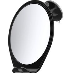 an oval mirror is mounted on the wall with a black holder for it's head