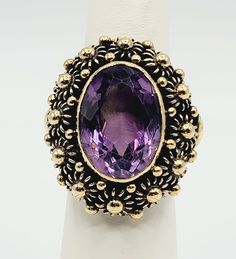 14K Yellow Gold Purple Amethyst Edwardian Style Cocktail Ring Size 6.5 A perfect gift for your loved one for any special occasion or holiday! Total Ring Weight: 13.32g Ring Length: 27.92mm Ring Width: 25.11mm Gemstone: Purple Amethyst Item will be placed into a gift box. * Victorian Amethyst Ring With Center Stone As Gift, Antique Purple Amethyst Ring With Accent Stones, Victorian Style Purple Amethyst Ring As Gift, Victorian Style Purple Amethyst Ring For Gift, Antique Purple Rings As Gift, Antique Purple Rings For Gift, Heirloom Style Amethyst Ring As A Gift, Heirloom Amethyst Ring Suitable For Gifting, Heirloom Style Amethyst Ring For Gift