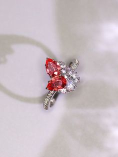 *Condition: Brand new *Center Stone: Natural Padparadscha Sapphire, Teardrop Cut, approx 0.55/0.66ct *Side stones: Natural white diamond round-cut (VS1 clarity and F color) Natural white sapphire *Metal Purity: Can be select Each piece is made-to-order with care and special attention to detail. all items are made with conflict-free diamonds and gems. Size: made to order The item will be gift wrapped and shipped. ------------------------------------------------------------------- Available in : 1 Luxury Red Pear-shaped Ring, Luxury Pear-shaped Ruby Wedding Ring, Elegant Red Pear-shaped Diamond Ring, Teardrop Ruby Ring With Diamond In Fine Jewelry Style, Teardrop Ruby Ring In Fine Jewelry Style, Fine Jewelry Teardrop Ruby Ring With Diamond, Pear-shaped Ruby Ring For Wedding, Gift Ruby Ring With Diamond In Pear Shape, Gift Pear-shaped Ruby Ring With Diamond