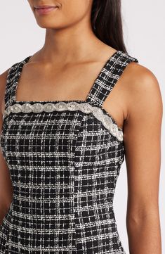 Braided rhinestone add a dab of dazzle to a tweedy dress turned out in beloved black and white. 35 1/2" length Exposed back-zip closure Square neck Lined 100% polyester Dry clean Imported Elegant Fitted Embellished Tweed Dress, Elegant Embellished Fitted Tweed Dress, Chic Embellished Fitted Tweed Dress, Tahari Dress, White Tuxedo, Tuxedo Dress, Square Neck Dress, Black Sheath Dress, Midi Sheath Dress