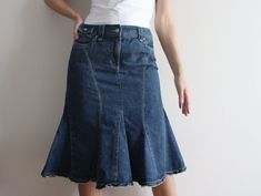 "Denim Skirt Blue Jean Skirt Women's Denim Skirt Midi Skirt Ruffled Flare Denim Skirt Low Waist Midi Jeans Skirt Large Size Label size: 40 EUR / Large Fit size: Medium to Large   Model is 5.77 ft (176 cm) tall, she normally wears size S/M Measurements (laying flat): Waist: 15.5\" / 39.5 cm Hips: ~19.5\" / 49.5 cm Length: 26.5\" / 67.5 cm Condition: Great Vintage Condition Material: 100% cotton Please check measurements to insure a proper fit. Remember to allow yourself some extra room for movement. You can compare these with something from your closet that fits you well. SHIPPING: * I ship worldwide via Priority mail (Latvijas Pasts) from Latvia (EU). * Items are shipped 1 - 5 business days after receiving the payment. * I ship from Europe, so please allow 3 to 4 weeks for the package to a Flare Denim Skirt, Midi Jeans Skirt, Denim Skirt Midi, Flared Denim Skirt, Womens Denim Skirts, Midi Jeans, Blue Jean Skirt, Midi Denim, Jeans Skirt