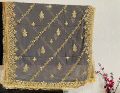 Beautiful golden embroidered Dupata with sequins &kiran lace all over. Unstitched Embroidered Gold Sharara, Gold Embroidered Unstitched Sharara, Unstitched Dola Silk Dupatta With Dabka Work, Gold Embroidered Sharara With Traditional Drape, Gold Georgette Sharara With Resham Embroidery, Gold Embroidered Fabric With Gota Work In Traditional Drape, Gold Embroidered Fabric With Gota Work, Traditional Drape Gold Embroidered Fabric With Gota Work, Eid Silk Embroidered Fabric With Gota Work