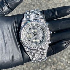 Step into elegance with this iced-out diamond timepiece that mirrors genuine luxury watches. We utilize premium simulated diamonds crafted from high-refractive crystals, ensuring a sparkle that rivals authentic diamonds under the light! INCLUDES AN EASY-TO-USE SIZE ADJUSTMENT TOOL Specifications: - Gender: Men's  - Case Size: 43mm - Movement: Quartz Movement - Battery: Included - Sizing: 8.5-inch band - Adjustable: Links are removable to fit your wrist - Back: Stainless Steel - Lock: Fold-over Clasp - Stone: VVS Diamond Simulate - Case Material: Alloy - Finish: Gold/Silver Plating  Whether you're dressing up for casual days, events, or gifting someone special on occasions like Graduations, Valentine's Day, Anniversaries, Birthdays, Thanksgiving, Christmas, New Year, or Father's Day, this w Luxury White Gold Diamond Watch With Rhinestones, White Gold Diamond Watch With Rhinestones, Diamond White Watch With Rhinestones For Formal Occasions, Diamond White Diamond Watch With Rhinestones For Formal Occasions, Formal Diamond White Watch With Rhinestones, Iced Out Diamond Jewelry And Watches For Gifts, Diamond White Watch With Rhinestones As Gift, Luxury Diamond Watch With Rhinestones, Luxury Round Diamond Watch With Rhinestones