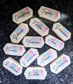 decorated cookies with names and hearts on them