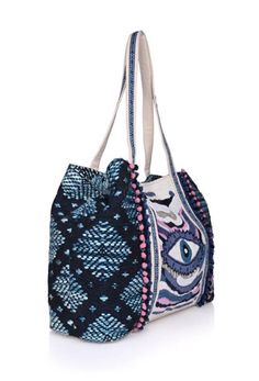 Turn heads with the Smokey Evil Eye Tote, a stunning blend of hand-beaded artistry and intricate embroidery. Lightweight yet spacious, it's the perfect companion for travel, beach outings, or any occasion where you want to stand out. Key Benefits & Features: Evil Eye Design: Hand-beaded and embroidered with the captivating evil eye motif, this tote offers both protection and style. Versatile & Spacious: With dimensions of 24" x 13" x 6", this tote is perfect for carrying your essentials in style Bohemian Beaded Beach Bag For Summer, Beaded Beach Bags For Beach Season, Summer Vacation Beaded Shoulder Bag, Bohemian Beaded Crochet Bag For Beach, Bohemian Beaded Crochet Bag For The Beach, Bohemian Beaded Crochet Beach Bag, Rectangular Beaded Beach Bag, Summer Beaded Shoulder Bag For Daily Use, Beaded Bag For Everyday Use During Beach Season