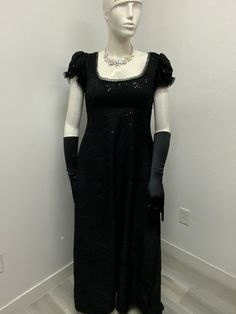 Beautiful black with sequins dress made with polyester lining .. perfect for a regency ball or tea party very elegant..Please not it takes me 5-8 business days to produce and ship your dress after order is placed . THERE IS NO RETURNS OR EXCHANGES ACCEPTED  PLEASE BE SURE TO CHECK THE MEASUREMENTS ON THE BOTTOM OF THE DESCRIPTION. If for any reason the measurements don't  match with yours be sure to provide to me at the time of order. PLEASE NOTE COLOR MAY BE A LITTLE DIFFERENT ONCE YOU SEE IT, If measurements are not provided at the time of purchase we will send the dress with the measurements provided here on the listing PLEASE ADVISE OF THAT SMALL / BUST / Length                  32-34.     44 MED   /    36-38 /  46 LARGE /. 40-42/ under bust 38 and length 47" The small dress is made wi Black Bridgerton Dress, Black Regency Gown, Black Evening Dress For Costume Party During Prom Season, Sequined Fitted Evening Dress For Formal Occasions, Elegant Victorian Dress With Fitted Bodice And Empire Waist, Black Victorian Ball Gown For Evening, Formal Evening Dress With Fitted Bodice, Tea Length, Fitted Formal Evening Dress For Holidays, Fitted Bodice Evening Dress With Empire Waist