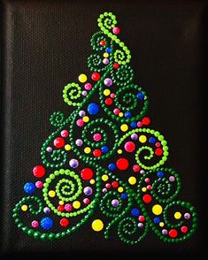 a colorful christmas tree made out of beads