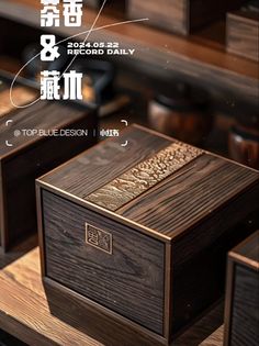 a wooden box sitting on top of a table next to other wood boxes and drawers