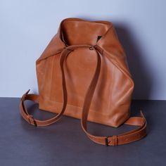 "Convertible backpack purse for women is made of genuine leather and can be transformed into a tote bag.  ✨ Gorgeous 2-in-1 bag. Suited be taken to shopping mall, restaurant or working place. The classic design would perfectly show your taste. Made of high-quality leather called Crazy Horse. 👀 You can wear it either as a shoulder bag or a backpack. 🔥 This accessory is completed with: -- two exterior pockets -- one interior pocket -- a spacious main compartment that secures with a zipper and magnetic clasp. ✅ Dimensions: 12.9 x 13.9 x 3.9 in / 33 x 35.5 x 10 cm; ✅ Exterior pockets: 13 x 6.3 in / 33 x 16 cm; ✅ Interior pocket: 9.8 x 8.2 in / 25 x 21 cm; ✅ Weight: 0.8 kg / 1.76 Ib. 🤍 Personalization All the details about personalization here: https://etsy.me/3u9IzB3 Key facts about the lea Large Capacity Rectangular Leather Backpack For Everyday, Rectangular Soft Leather Backpack For On-the-go, Modern Leather Satchel Backpack With Large Capacity, Modern Brown Leather Backpack For Daily Use, Leather Large Capacity Backpack For Errands, Versatile Leather Backpack, Modern Large Capacity Rectangular Leather Backpack, Modern Soft Leather Rectangular Backpack, Modern Rectangular Soft Leather Backpack