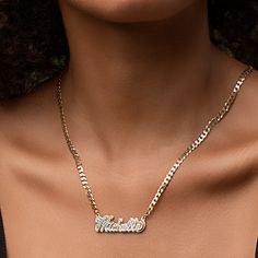 Our popular Double Plated Iced Out Script Name Necklace boasts a chic and elegant design, handcrafted to perfection. The model showcases the necklace with an 18-inch Cuban chain (see image for reference). Chain width:Cuban Chain - 3.7 mmFigaro Chain - 3 mm Closure: All chains are fitted with a lobster clasp. Metal Selection: Gold Plated Silver Plated Sterling silver 14k gold plated over sterling silver 10k solid gold - (NAMEPLATE ONLY)14k solid gold - (NAMEPLATE ONLY) Elegant Personalized Link Necklaces, Anniversary Jewelry With Adjustable Cuban Link Chain, Anniversary Cuban Link Necklace With Adjustable Chain, Anniversary Cuban Link Necklace With Medium-length Chain, Cuban Link Jewelry With Adjustable Chain For Anniversary, Elegant Personalized Link Jewelry, Gold Nameplate Jewelry With Box Chain, Metal Name Necklace With Adjustable Chain For Anniversary, Elegant Name Necklace With Chain For Gift