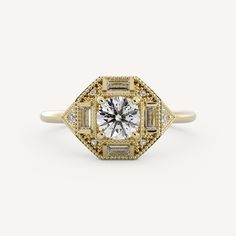 a yellow and white diamond ring with two baguets in the center, surrounded by diamonds