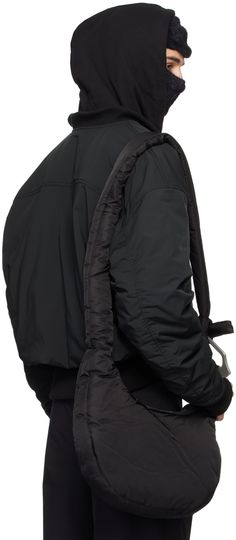 Polyester taffeta bomber jacket. · Detachable hood · Rib knit stand collar, hem, and cuffs · Two-way zip closure · Logo plaque at chest · Welt pockets · Velcro panel at hem Supplier color: Black Nylon Techwear Outerwear With Ribbed Cuffs, Nylon Outerwear With Zip Cuffs For Streetwear, Nylon Outerwear With Ribbed Cuffs For Streetwear, Functional Nylon Outerwear With Zip Cuffs, Nylon Outerwear With Zip Cuffs For Outdoor Use, Techwear Outerwear With Padded Collar In Nylon, Winter Nylon Outerwear With Zip Cuffs, Heliot Emil, Detachable Hood