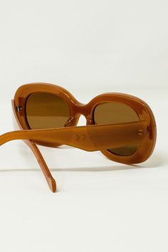 Introducing our Oversized Circular Sunglasses in Brown, the epitome of chic and contemporary eyewear for the modern, fashion-conscious woman.Embrace the circular trend with these oversized sunglasses that effortlessly combine vintage-inspired design with a modern twist. The circular shape adds a touch of elegance and allure, making them a standout accessory that complements any outfit with a unique and captivating charm. In a captivating shade of brown, these sunglasses exude warmth and sophisti