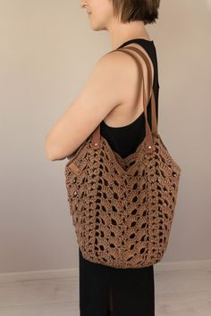 This raffia crochet shopper bag made of natural organic raffia will be your perfect accessory for warm summer days.  Organic raffia is an environmentally friendly raw material. This is a 100% natural material, avocado fibers and banana leaves are used for production. ♥ Raffia is strong and elastic, it holds its shape and volume well, so products made of it can be folded and bent, if necessary. ♥  Raffia is resistant to moisture and burning. ♥  Raffia products are light and pleasant to the touch, Chic Crochet Bag With Open Weave, Chic Natural Crochet Bag With Open Weave, Handwoven Brown Hobo Bag For Summer, Summer Brown Handwoven Hobo Bag, Brown Handwoven Hobo Bag For Summer, Everyday Brown Crochet Bag With Braided Handles, Chic Natural Handwoven Crochet Bag, Chic Open Weave Straw Bag For Market, Chic Crochet Jute Bag With Open Weave