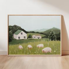 a painting of three sheep grazing in a field with a house and mountains in the background