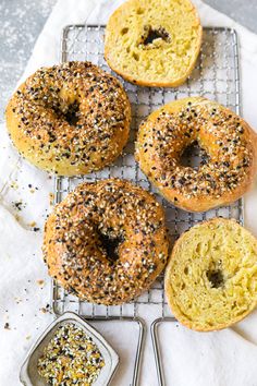 four bagels sitting on top of a cooling rack