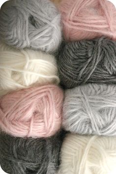 several skeins of yarn are arranged together