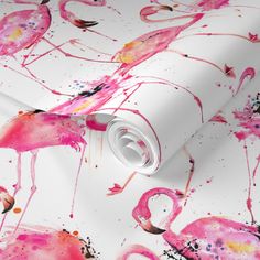 pink flamingos on white wallpaper with watercolor spots and splatters in the background