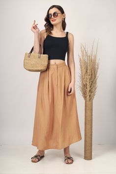 "Beige Pleated Maxi skirt for women skirt, Long skirt, Custom made, Made to order, Plus size -Model height: 5'7\" wearing size S -Length: 38\" -Fit: A-line -Closure: Front button and zipper" Beige Gathered Maxi Skirt, Brown Midi Skirt For Summer, Fitted Brown Wrap Skirt For Summer, Brown Flared Gathered Skirt, Brown Fitted Wrap Skirt For Summer, High Waist Flowy Brown Skirt, Brown Flared Gathered Skirt Bottoms, Summer Wrap Skirt With Gathered Detail, Brown Long Skirt With Lining