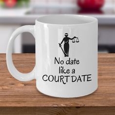 a white coffee mug with the words no date like a court - date on it