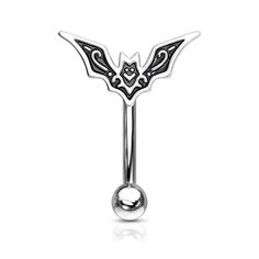 a metal belly ring with a bat design on it