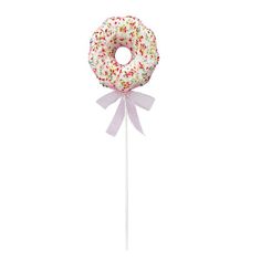 a donut lollipop with sprinkles and pink ribbon on a stick