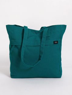 The Executive Tote is large enough to fit all your office accessories, sturdy enough to stand on its own for easy loading, it’s a snap to open and close, and it’s made with Fairtrade Certified organic cotton, making it a great choice for anyone looking for sustainable tote bags. Teal Tote Bag, Handwritten Gifts, Wall Decor Storage, 2024 Wishlist, Shopping Totes, Canvas Work, Feeding America, Work Tote Bag, Work Tote