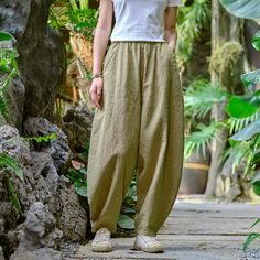 Introducing our Women Elastic Waist Pants in a delightful autumn light yellow. Crafted from a blend of linen and cotton, these pants offer a comfortable and breathable fit. The wide-leg design and mid-waist style make them a versatile addition to any wardrobe. The pants feature a retro casual design, adding a touch of vintage charm to your outfit. With a waist size ranging from 66-96cm/25-37' Hips: 122cm/48' Pants length: 98cm/38', they are designed to accommodate a variety of body types. The me Chinese Shoes, European Shoes, Linen Crops, Cropped Wide Leg Pants, Autumn Lights, Casual Design, Elastic Waist Pants, Leg Design, Pants Length