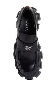 A '90s-inspired, superchunky lugged sole dramatically lifts this loafer crafted from polished Italian leather and branded with Prada's enameled triangle logo. Leather upper and lining/rubber sole Made in the UK Men's Designer Shoes Prada Loafers Men, Prada Shoes Men, Prada Monolith, Designer Shoes Men, Designer Shoes For Men, Gents Shoes, Prada Loafers, Matric Dance, Prada Accessories