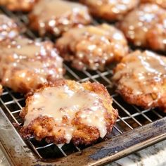 some food is cooling on a grill with gravy drizzled over it