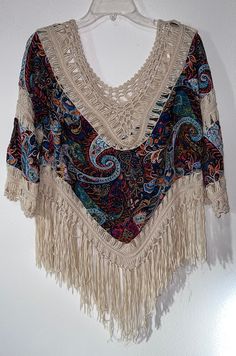 Preowned Hippie Poncho With Tassels, Bohemian Crochet Top With Crochet Trim For Fall, Casual One Size Poncho With Fringe, Casual One-size Poncho With Fringe, Casual Festival Poncho With Fringe, Fringe Poncho For Vacation, Fall Festival Poncho With Tassels, Casual One Size Fringe Shawl, Casual One-size Shawl With Fringe