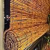 the inside of a bamboo structure with lights on it