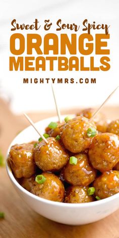 sweet and sour orange meatballs in a white bowl