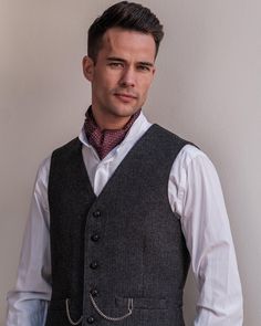 It's timeless quality makes this Irish tweed waistcoat well worth investing in if you have a penchant for classic Irish Design. Perfect for an all year round appeal. Full cloth back and front, Working pockets. Fully Lined. The traditional herringbone green tweed contains flecks of colour, for an immediate feel of the Irish landscape. 6 Button closing, Darted front, 2 Working pockets. Full cloth back. Belted back. Tailored Single-breasted Tweed Vest, Classic Tweed Vest For Work, Classic Tweed Three-piece Suit For Semi-formal Occasions, Fitted Single-breasted Tweed Vest, Tailored Tweed Vest For Formal Occasions, Formal Tailored Tweed Vest, Classic Business Vest For Winter, Classic Formal Winter Vest, Tailored Classic Tweed Vest